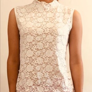 White sleeveless shirt